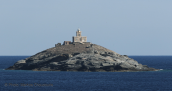 The lighthouse at Disvato at Tinos island