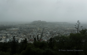 Athens covered by a cloud of dust