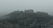 Athens covered by a cloud of dust